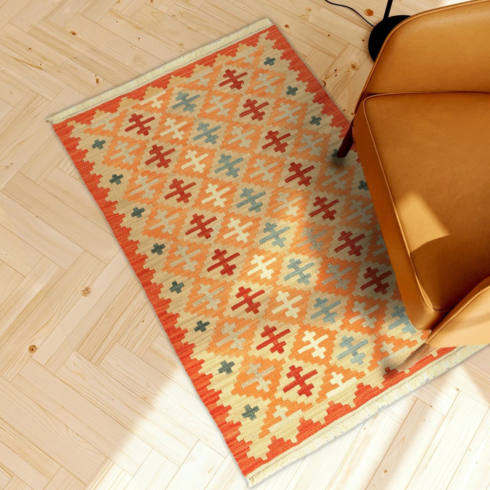 Small Kilim Rug in Orange and Beige in a light living room, true size